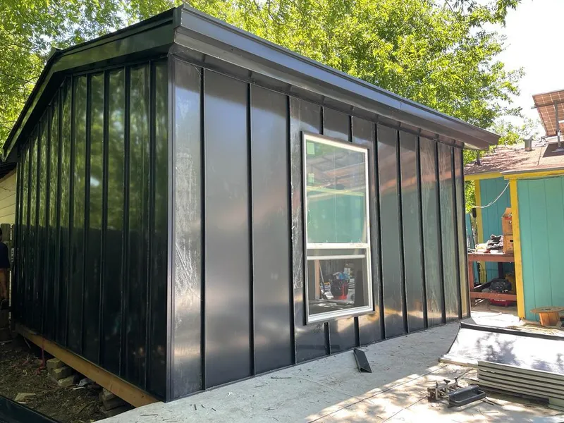 Black standing seam metal wall panels for Roof Inspection in Dyersburg